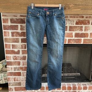 Women's Wrangler Premium Patch Blue Jeans size 1/2x32”